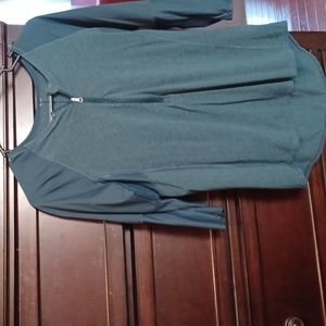 Teal colored 3/4 sleeve lululemon top